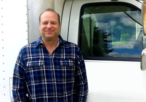 Jack, one of our plumbers in Germantown standing by his truck